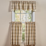 Toffee & Elm Plaid Layered Valance and Cafe Tiers including a valance on top and two tier panels below, shown hanging on a white window frame against a beige wall.