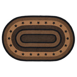 Blackstone Farm Star braided oval rug in black and tan jute — flat lay product shot showing full perimeter star border design
