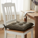 Bridgeton Black Chair Pad placed on a kitchen chair