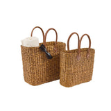Brinkley Rattan Leather Handle Totes Set of 2 — lifestyle view with folded towel and sunglasses in large tote