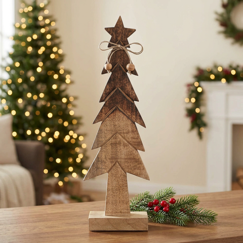 Christmas wooden tree figurine in a cozy Christmas setting