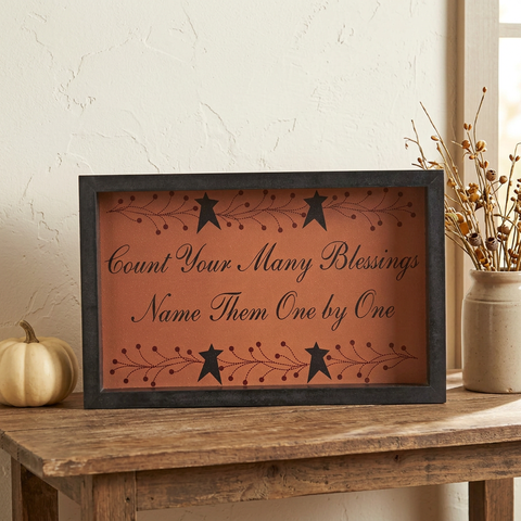 Revised square lifestyle image with the original sign resting on a console table