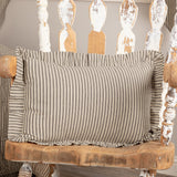Farmstead Charcoal & Dark Creme Ticking Stripe Throw Pillow Rectangular pillow on farmhouse rustic white chair