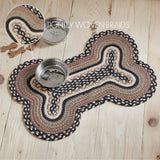 Farmstead Charcoal Dog Bone Braided Rug Mat on pine wood floor with stainless bowl and tightly woven braids callout inset highlighting recycled PET construction