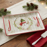 Joy Snowman Platter in a Christmas tabletop setting
