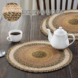 Kettlehurst Braided Trivet 15" Set of 3  Round woven placemats on a wooden table with a teapot and cup with "tightly woven braids" callout