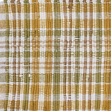 Close-up of a woven fabric of Sage & Mustard Plaid Chindi Table Runners