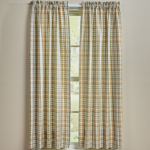 Sage & Mustard Plaid Short Panel Curtains 63" hanging in front of a window with a beige wall background